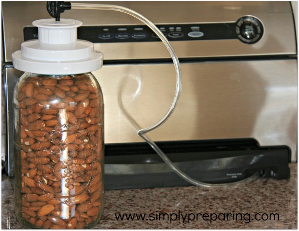 vacuum sealing nuts in a Mason jar with my Food Saver