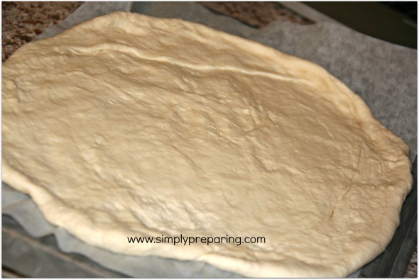 pizza dough ready for toppings